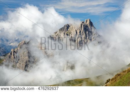Dolomites Mountains In The Middle Of Clouds, Carnian Alps Mountains, Italy