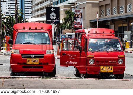 Thailand, Patong - 03.27.23: Small Japanese Trucks Converted Into Taxis For Tourists Called Tuk Tuk 
