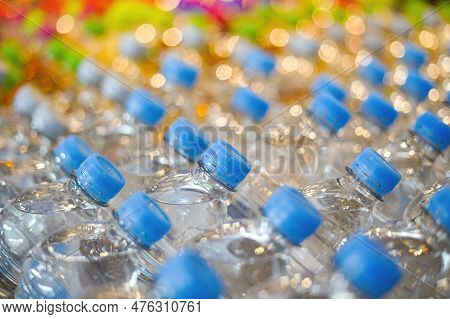 Plastic Transparent Water Bottles For Drinking On A Warehouse Showcase In A Stor