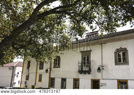 Evora, Portugal- October 10, 2022:typical Portuguese Facades And Cobblestone Streets In Evora Town, 