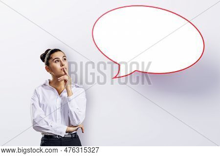 Attractive Young European Woman With Speech Bubble On White Background. Opinion, Speech And Communic
