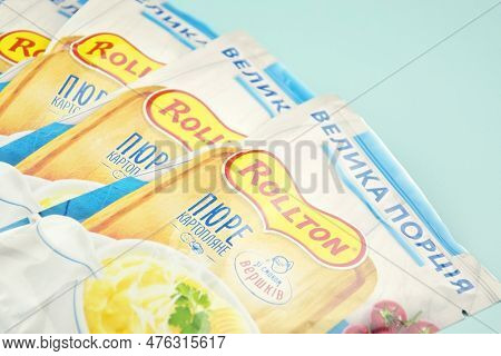 Rollton Instant Mashed Potatoes On A Blue Background. Fast Food, Junk Food.