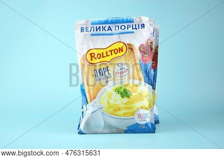 Rollton Instant Mashed Potatoes On A Blue Background. Fast Food, Junk Food.