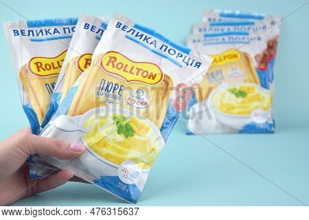 Kharkiv, Ukraine - February 12, 2023: Rollton Instant Mashed Potatoes On A Blue Background. Fast Foo