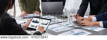 Panorama Shot Analyst Team Utilizing Bi Fintech To Analyze Financial Report With Tablet. Businesspeo