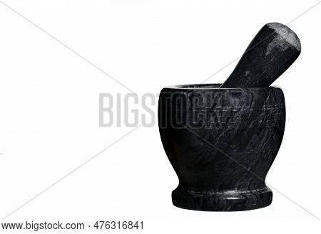 Close-up Of A Massive Heavy Dark Stone Jar With Mortar Grinder For Crushing And Pulverizing Spices S