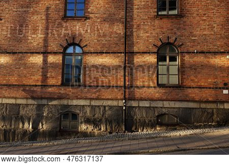 Umea, Norrland Sweden - November 8, 2022: Part Of Old Brick Customs House In Sunset
