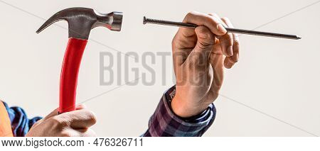 Hand With Hammer Nailing. Hands With Hammesr And Nail. Hammering A Nails, Hands Only. Hammer Hand Na