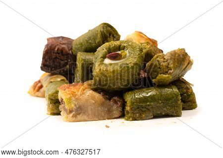 Turkish Pistachio Baklava Isolated On A White Background. A Variety Of Turkish Sweet Baklava. Walnut