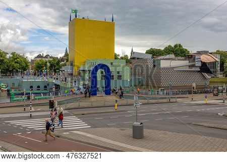 Groningen, The Netherlands - July 7, 2022: Futuristic Museum Of Modern Art With Pedestrians At Cross