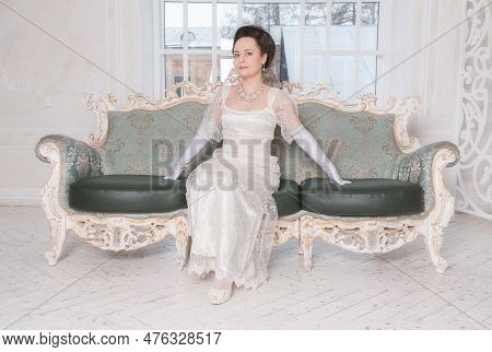 Beautiful Young Woman Wearing Medieval Vintage Edwardian Style Dress
