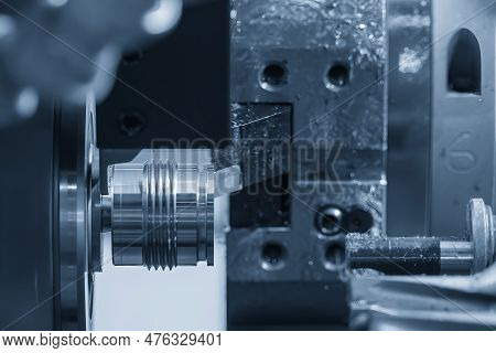 The Multi-tasking Cnc Lathe Machine Swiss Type Finish Cut The Metal Pipe Parts. The High Technology 