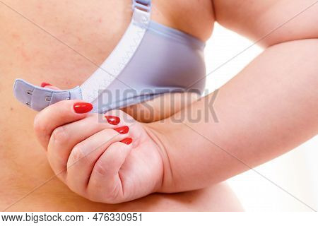 Fat Woman Rear View Opening Taking Off Or Putting On Her Bra. Plus Size Overweight Female Wearing Li