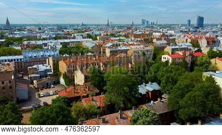 Riga Cityscape Spring Aerial Top View Video, Town, Latvia. Sunny Day Building Rooftops. Riga Skyline