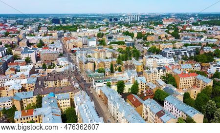 Riga Cityscape Spring Aerial Top View Video, Town, Latvia. Sunny Day Building Rooftops. Riga Skyline