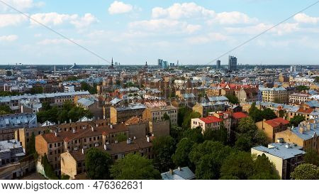 Riga Cityscape Spring Aerial Top View Video, Town, Latvia. Sunny Day Building Rooftops. Riga Skyline