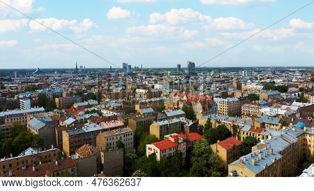 Riga Cityscape Spring Aerial Top View Video, Town, Latvia. Sunny Day Building Rooftops. Riga Skyline