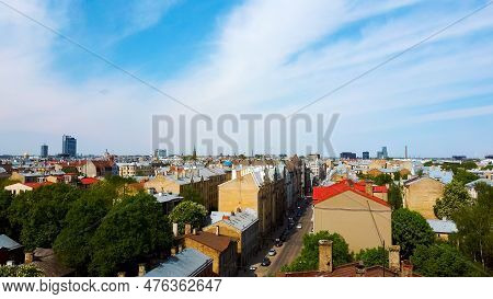 Riga Cityscape Spring Aerial Top View Video, Town, Latvia. Sunny Day Building Rooftops. Riga Skyline