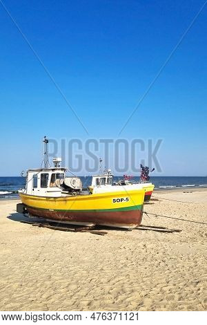 Sopot, Poland, April 21, 2023: Old Boat On The Sandy Beach Of The Baltic Sea