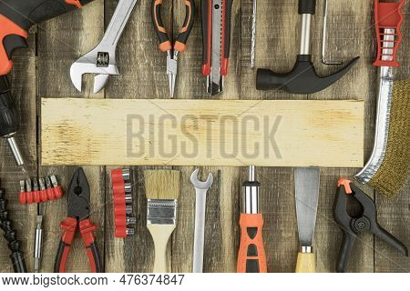 Construction Equipment, Layout Of Construction Tools. Repair Equipment On A Carpentry Wooden Table. 