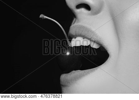 Cherry In Teeth, Macro, Close Up. Cherry In Woman Mouth. Cherries On Woman Lips. Girl Biting Cherry.
