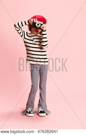 Portrait Of Little Girl, Cild In Striped Sweater And Red Beret Posing With Vintage Photo Camra Agais