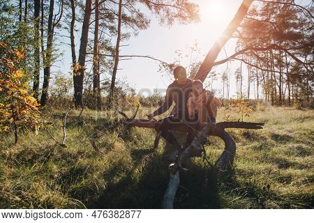 Happy Fathers Day. Dad And Son On A Walk In The Forest In Sunny Weather. Family Leisure. The Father 