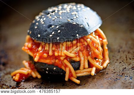 Close Up Of Charcoal Bun Spaghetti Sandwich