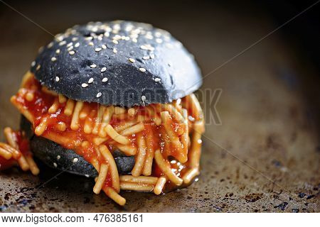 Close Up Of Charcoal Bun Spaghetti Sandwich
