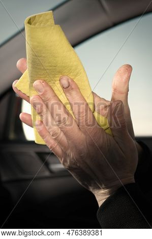 Older Man Take Care Annd Cleaning Car Interior On Nature Parking