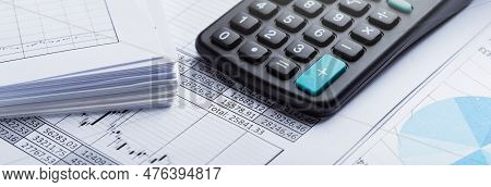 Calculator And Accounting Document. Concept Of Banking, Financial Report And Financial Audit.
