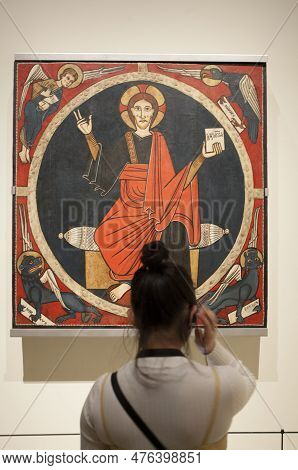 Barcelona, Spain - Dec 26th 2019: Wisitor Woman Listen Guide Tour With Headphone At National Art Mus