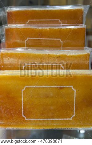 Burnt Egg Yolk Nougat Or Torro De Gema Cremada. Traditional Catalan Pastry Specialty Displayed At Go
