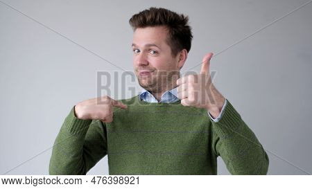 The European Young Man Proudly Points At Himself, Saying I Am Good With Myself