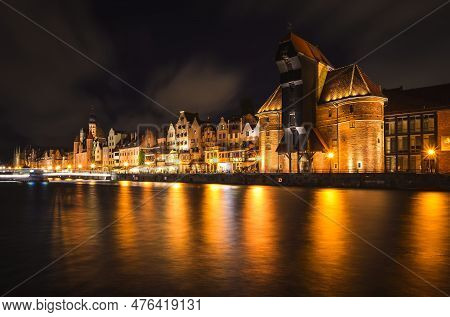 Gdansk, Poland - August 23, 2021: Beautiful Old Historic Crane In Gdansk On The Moltawa River.