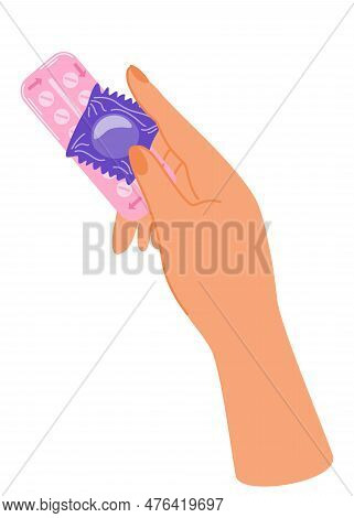 Hand Holding Different Types Of Contraception. Condom And Hormonal Contraceptive Pills For Safe Sex.