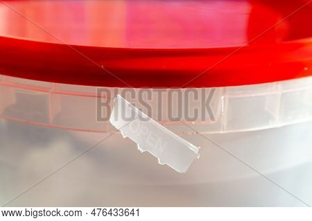 Close-up Of Empty Round Plastic Conteiner With Lid. Opened Conteiner