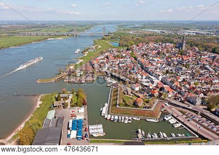 Aerial From The City Zaltbommel With The St. Martin Church In The Netherlands
