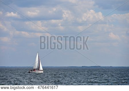 Boat At Sniardwy Lake. Sniardwy Is A Lake In The Masurian Lake District Of The Warmian-masurian Voiv