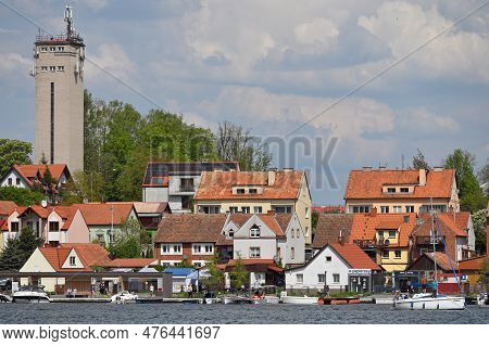 Mikolajki, Poland, May 14: View To City From The Lake On May 14, 2023 At Mikolajki, Poland. Mikolajk