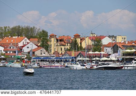 Mikolajki, Poland, May 14: View To City From The Lake On May 14, 2023 At Mikolajki, Poland. Mikolajk