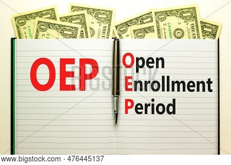 Oep Symbol. Concept Words Oep Open Enrollment Period On Beautiful White Note. Dollar Bills. Beautifu
