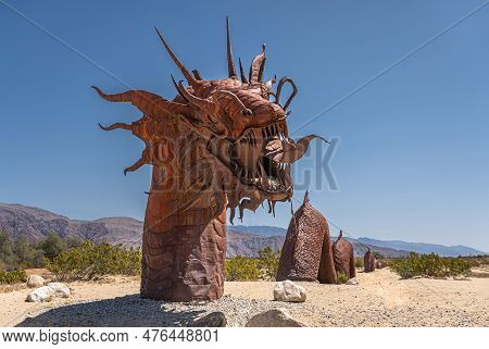Borrego Springs, Ca, Usa - April 24, 2023: Brown Rusted Metal Prehistoric Giant Snake Dinosaur Statu