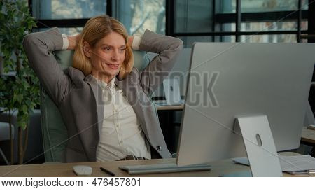 Middle-aged Adult Caucasian Woman 40s Satisfied Businesswoman Finished Computer Work Stretching Sitt