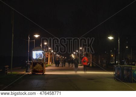Belgrade, Serbia - March 5, 2023: Selective Blur On People Walking At Night By Zemun Quay (zemunski 