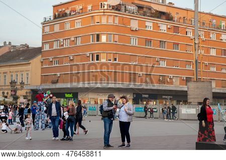 Novi Sad, Serbia - May 1, 2023: Tourists Taking Pictures On Trg Slobode Square The Main Square Of No