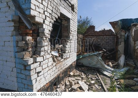 Countryside. A House Destroyed By Shelling (close-up). War In Ukraine. Russian Invasion Of Ukraine. 