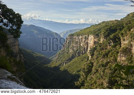 Spectacular Mountain Scenery, View From The Top Of The Manchego Waterfall, Which Falls Into The Chic