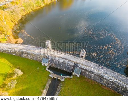 Fojtka Water Reservoir Surrounded By Vibrant Colored Forest At Autumn Time. Aerial View From Drone.