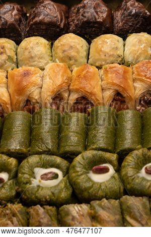 Turkish Pistachio Baklava Isolated On A White Background. A Variety Of Turkish Sweet Baklava. Walnut